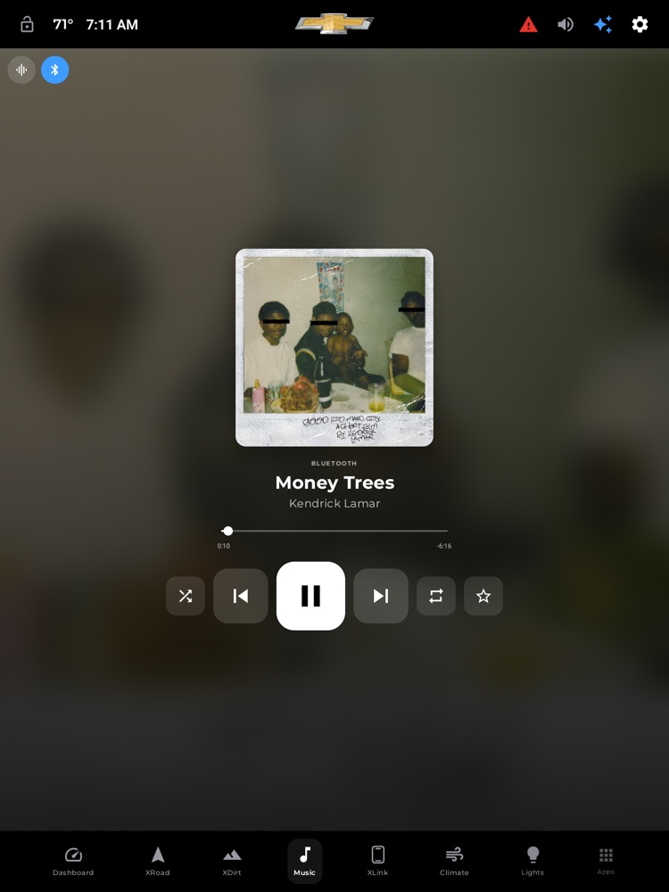 The Music page — now-playing, source, scrubber, and the capability-aware transport.